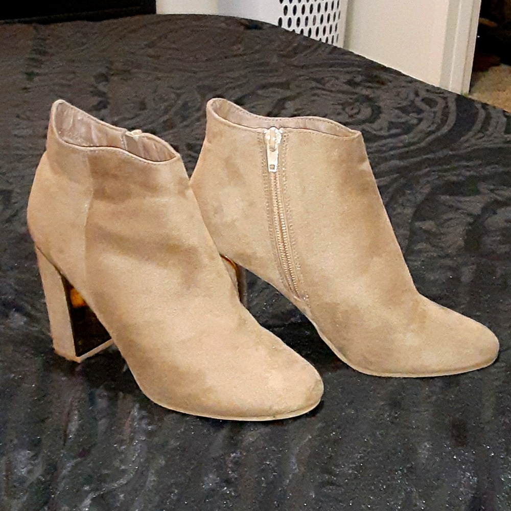 Beige or nude booties suede